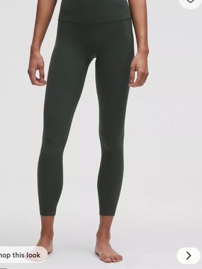 lululemon dark green athletic leggings with reflective logo